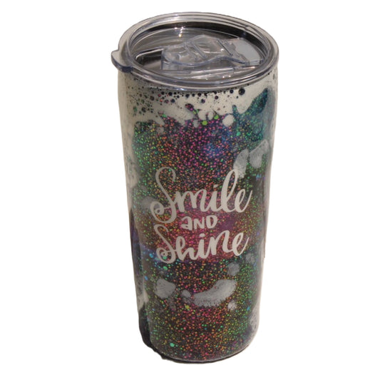 A bubbly decorated tumbler with the words Smile and Shine