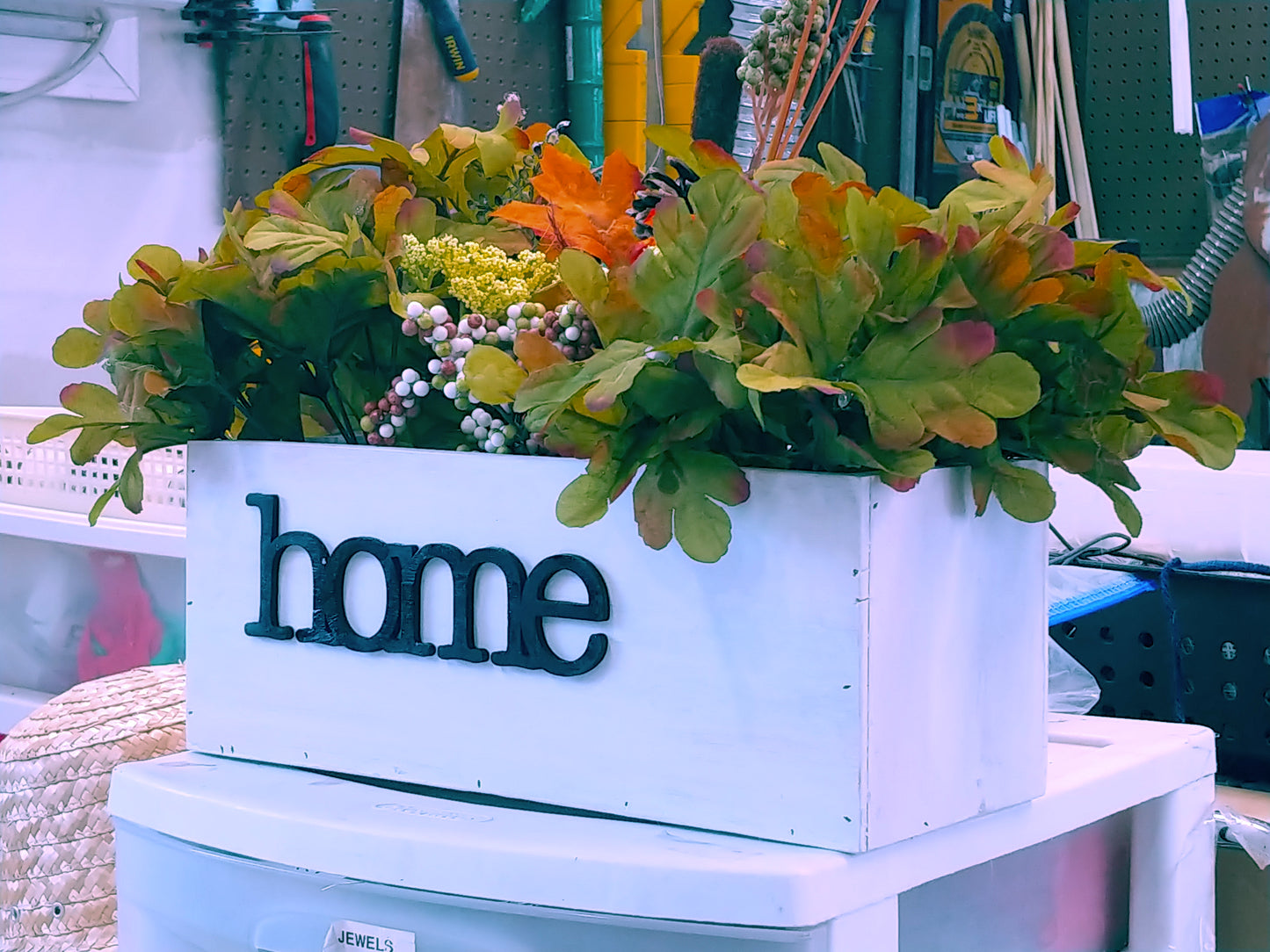 Contemporary flower planter box with the word HOME in 3D letters