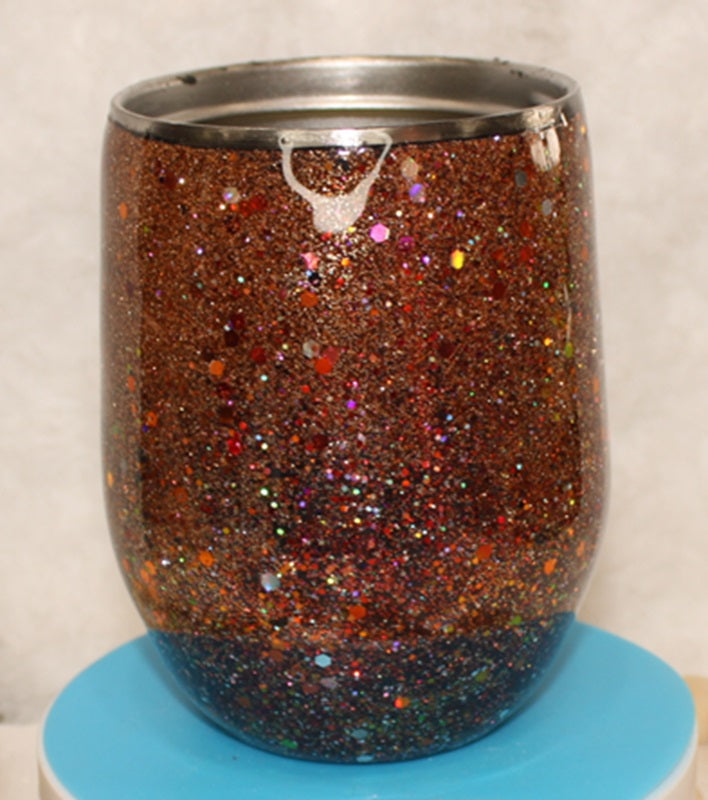 Tumbler Wine glass Stemless 12 ounce we've called (Sparkly Copper). Stainless Steel cup painted and epoxied in layers of beautiful colors.