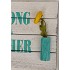 Decorative Sign Strong as a Mother and has two vases with flowers on each side