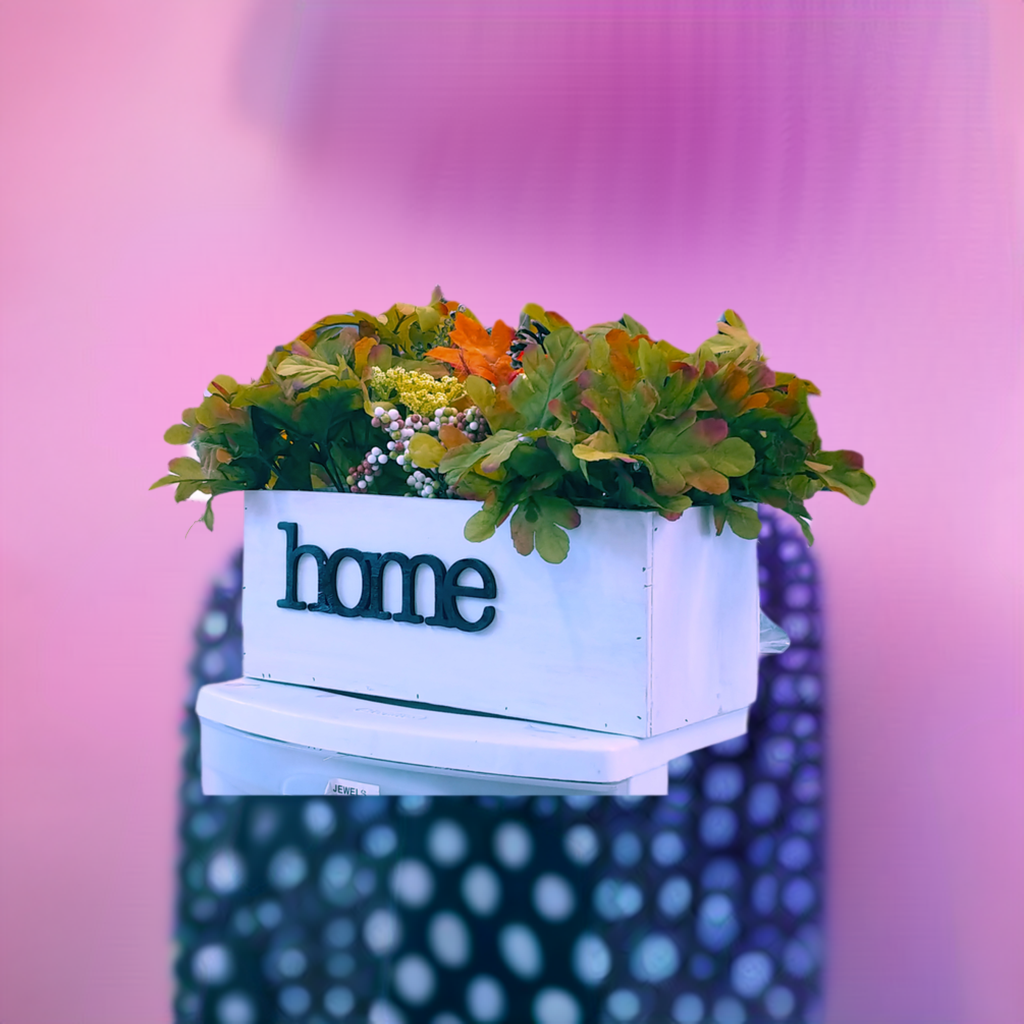 Contemporary flower planter box with the word HOME in 3D letters