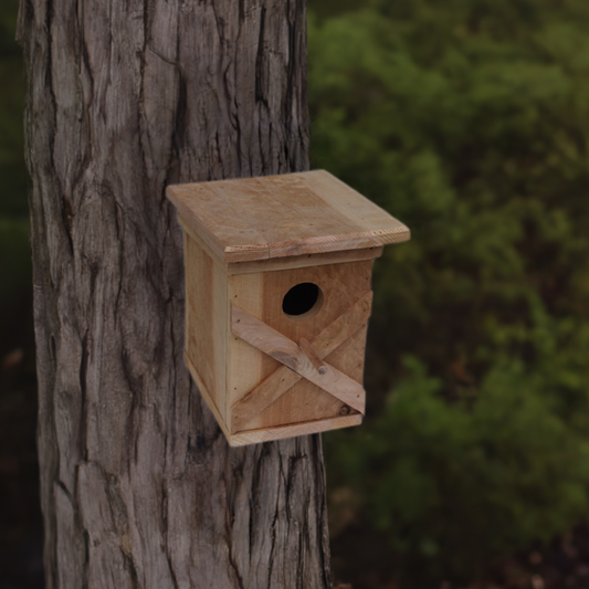 Bird House with an X pattern on front made from cedar