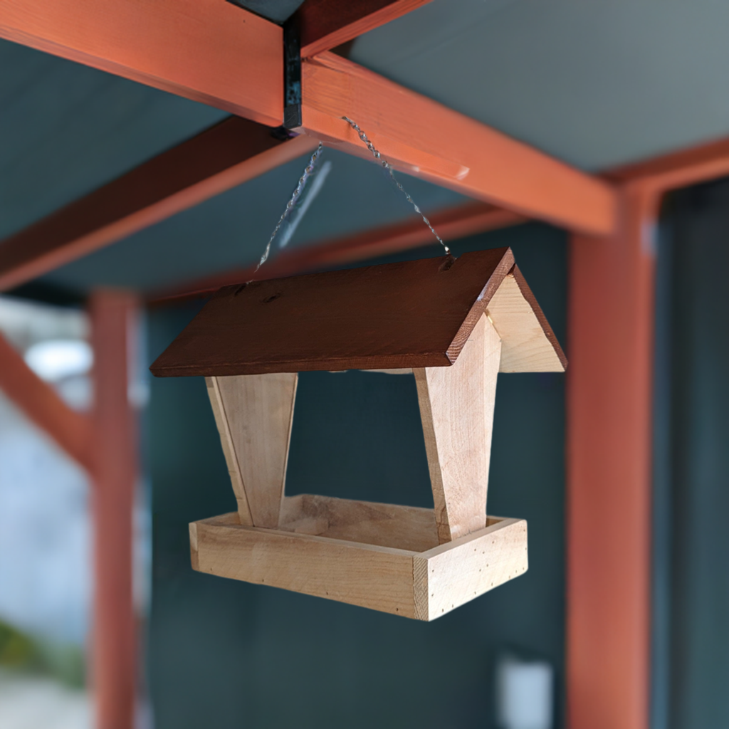 Bird Feeder made from cedar with hinged roof. 14 inches tall x 14 inches long x 10 inches wide, Holds 2 cups of birdseed.