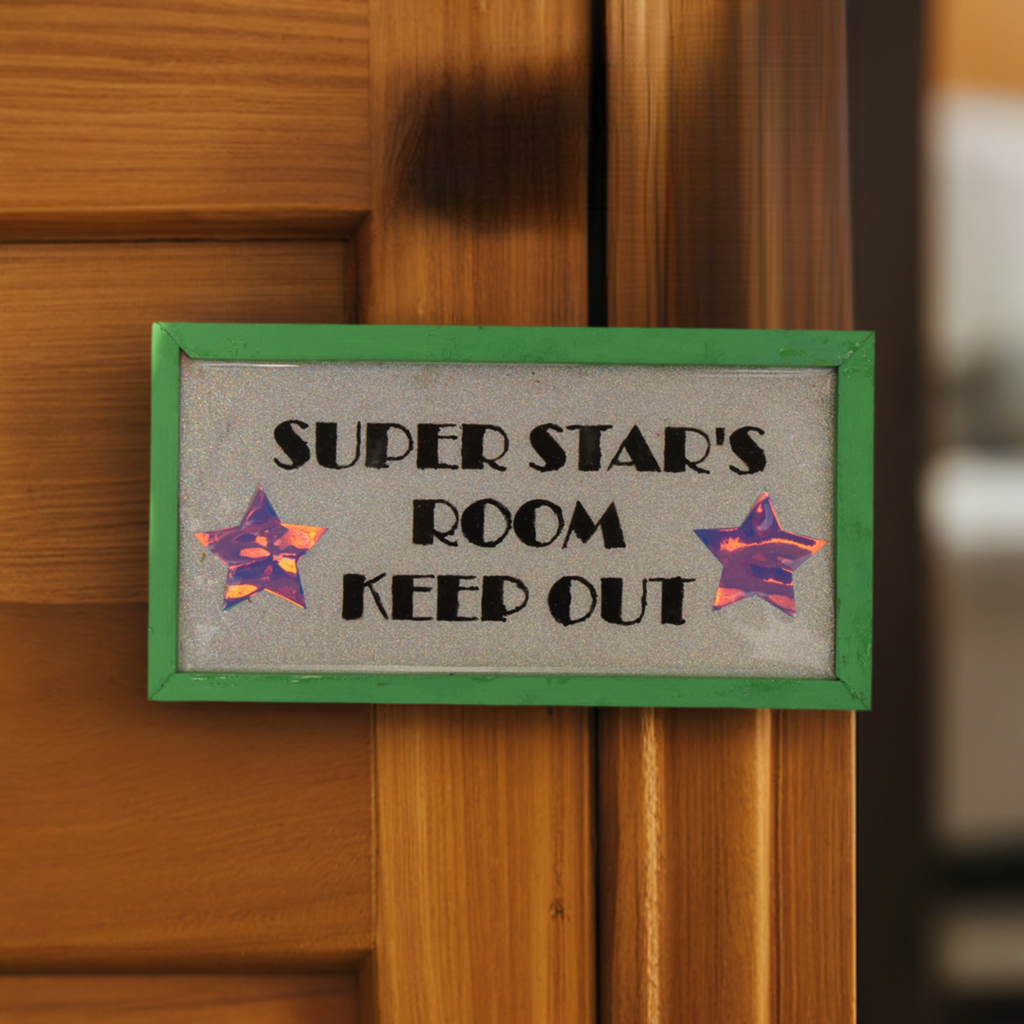 Decorative Sign that reads "Super Star's Room Keep Out" with glitter