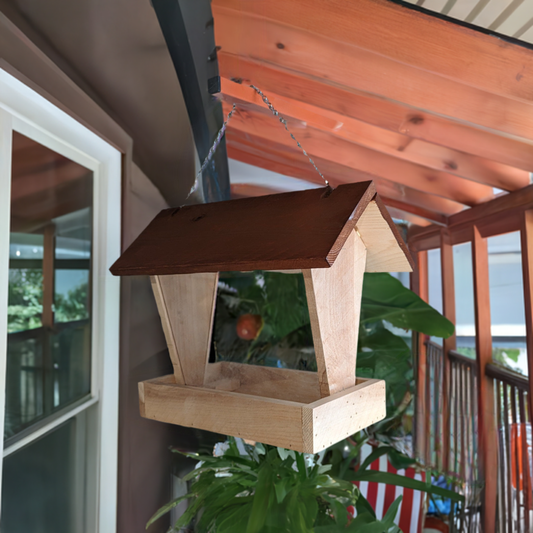 Bird Feeder made from cedar with hinged roof. 14 inches tall x 14 inches long x 10 inches wide, Holds 2 cups of birdseed.