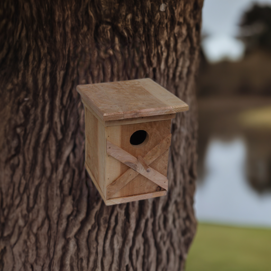 Bird House with an X pattern on front made from cedar